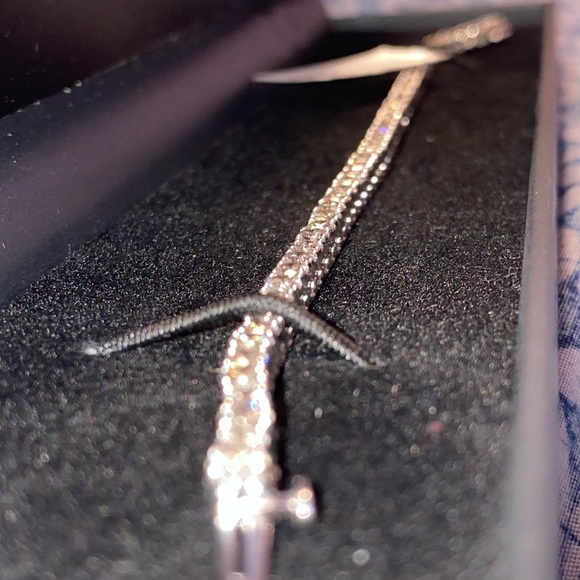 diamond tennis bracelet is set in elegant 14k white gold. - Picture 9 of 10